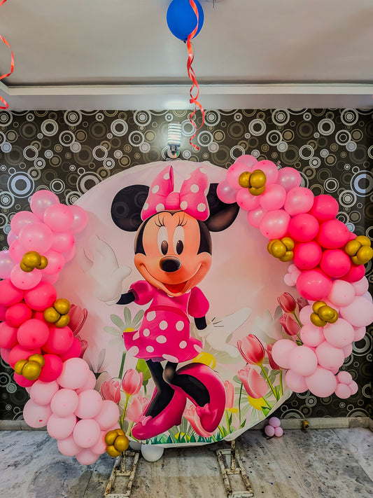 Minnie Mouse Theme Birthday Decoration with balloons.