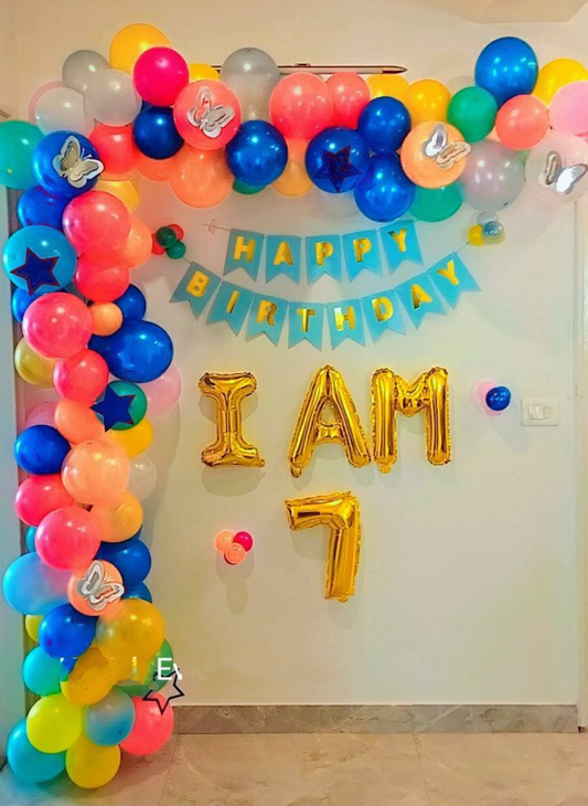 Balloon Decoration Rainbow theme for a 7th Birthday Party