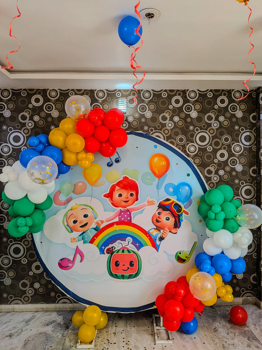 Cocomelon Theme Birthday Ring Decoration with balloons.