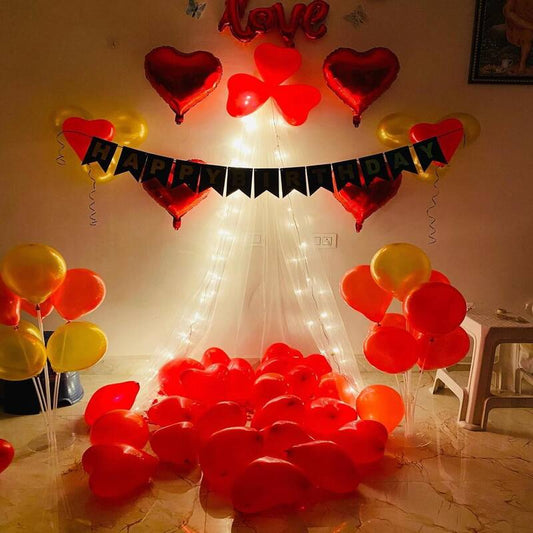 Romantic Cabana setup balloon decoration in living room with fairy light