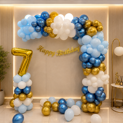 Balloon arch with 'Happy Birthday' and number '7' in a room setting