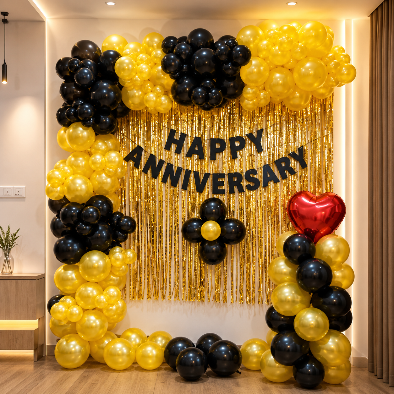 Decorative balloon arch with 'Happy Anniversary' text and balloons in a room setting.
