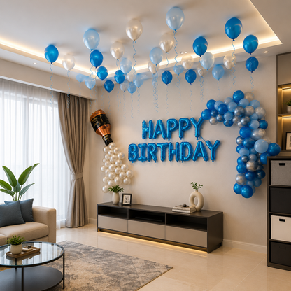 Living room decorated with blue and white balloons spelling 'Happy Birthday' on a wall.