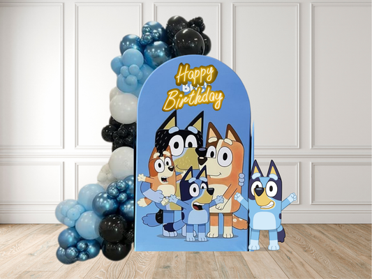 Bluey Theme arch with balloons and character cutout in a room with wooden fllor and white wall