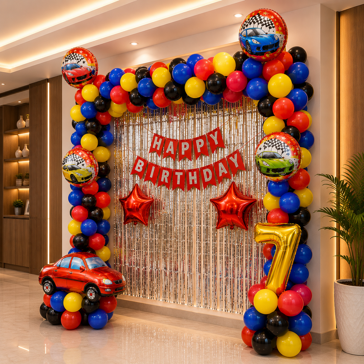Colorful birthday balloon arch with 'Happy Birthday' banner and number 7 in a room.
