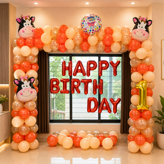 Birthday decoration with balloons and 'Happy Birthday' text in a room.
