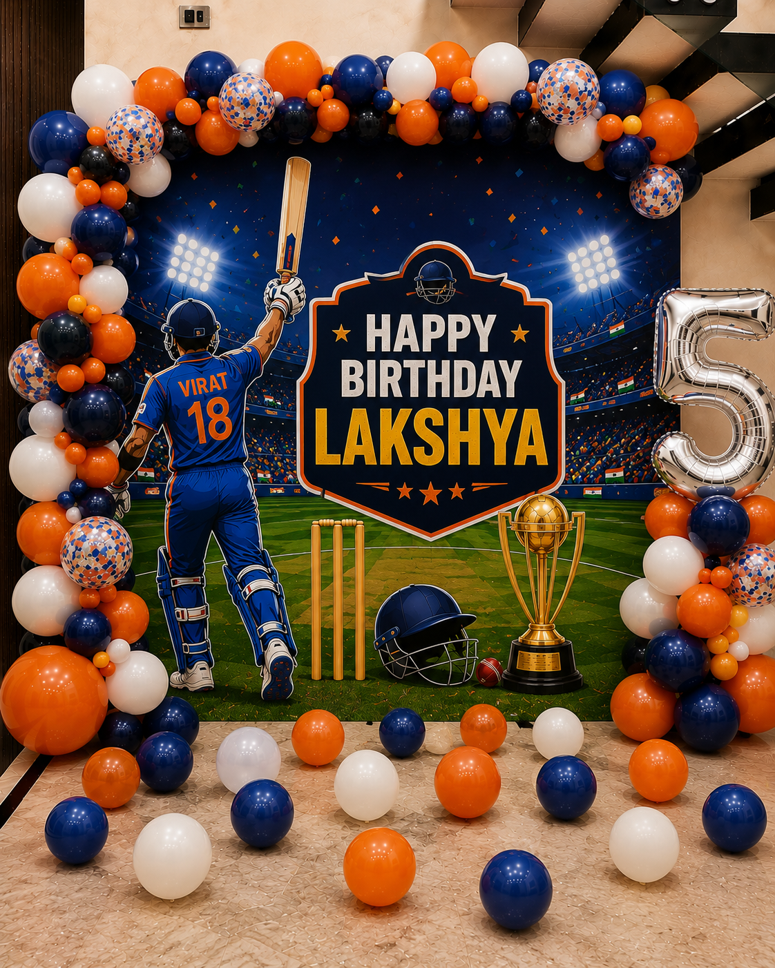 Birthday celebration setup with cricketer theme, balloons, and 'Happy Birthday Lakshya' sign.