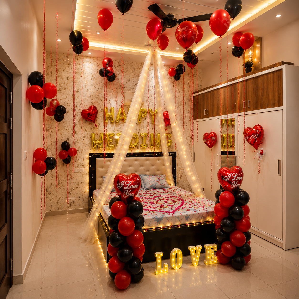 Decorated bedroom with balloons, lights, and 'Happy Wedding' signs.