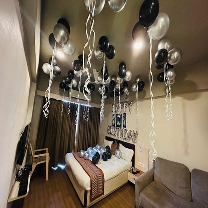 Silver and Black Balloon Decoration in Room for Birthday