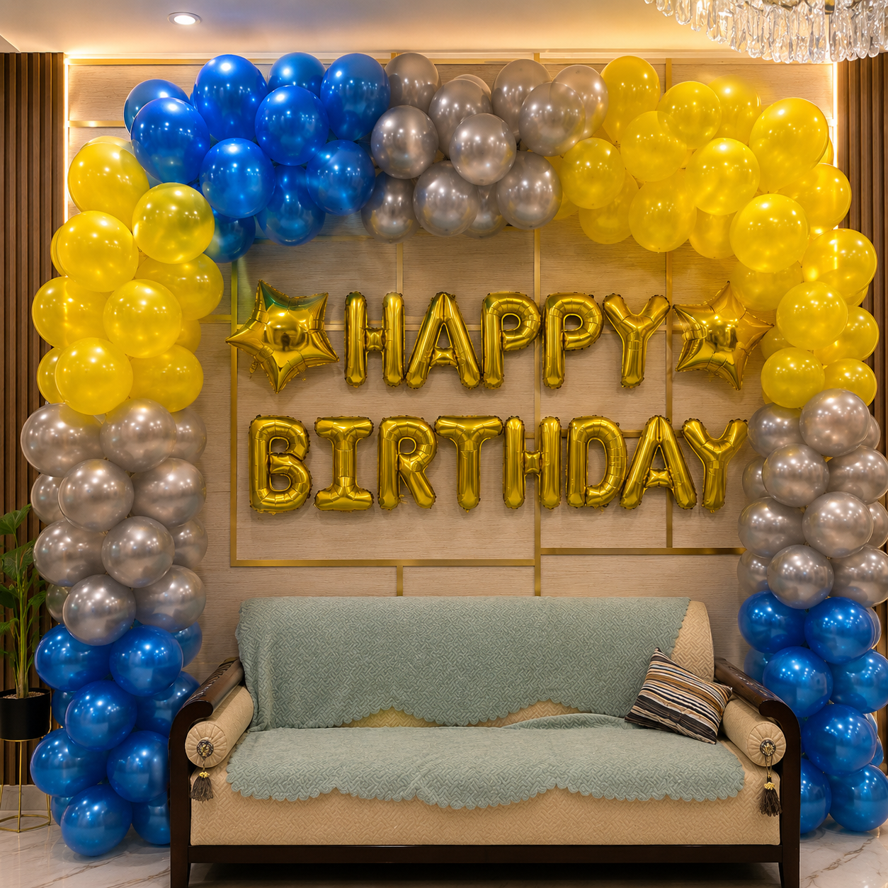 Birthday decoration with balloons and 'Happy Birthday' sign in a room.