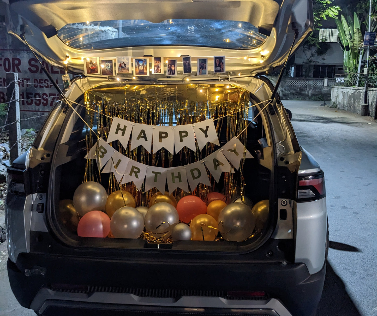 Car Boot Balloon Decoration for birthday with fairy lights and photos