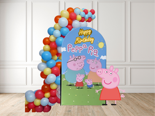 Peppa Pig birthday party setup with balloons and backdrop