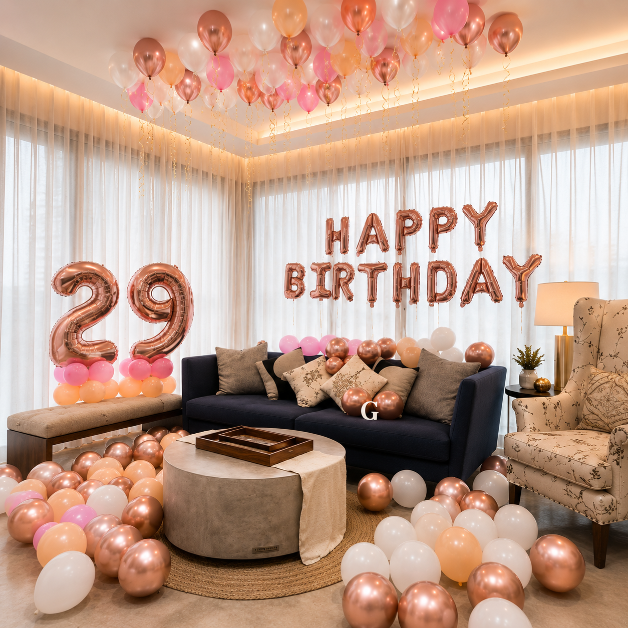 Birthday room decoration with balloons, 'Happy Birthday' and number '29' balloons, and a couch.