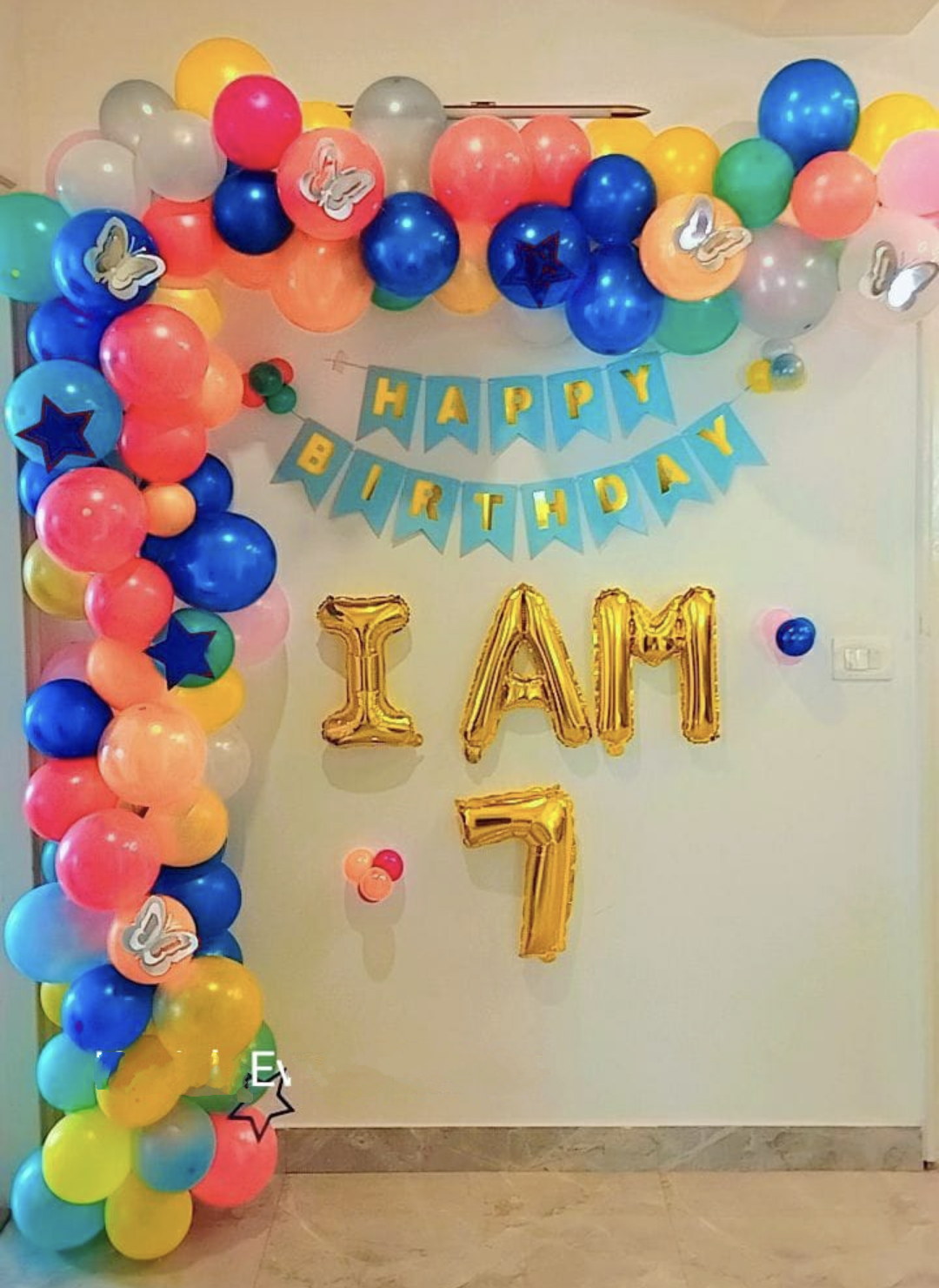 Balloon Decoration Rainbow theme for a 7th Birthday Party