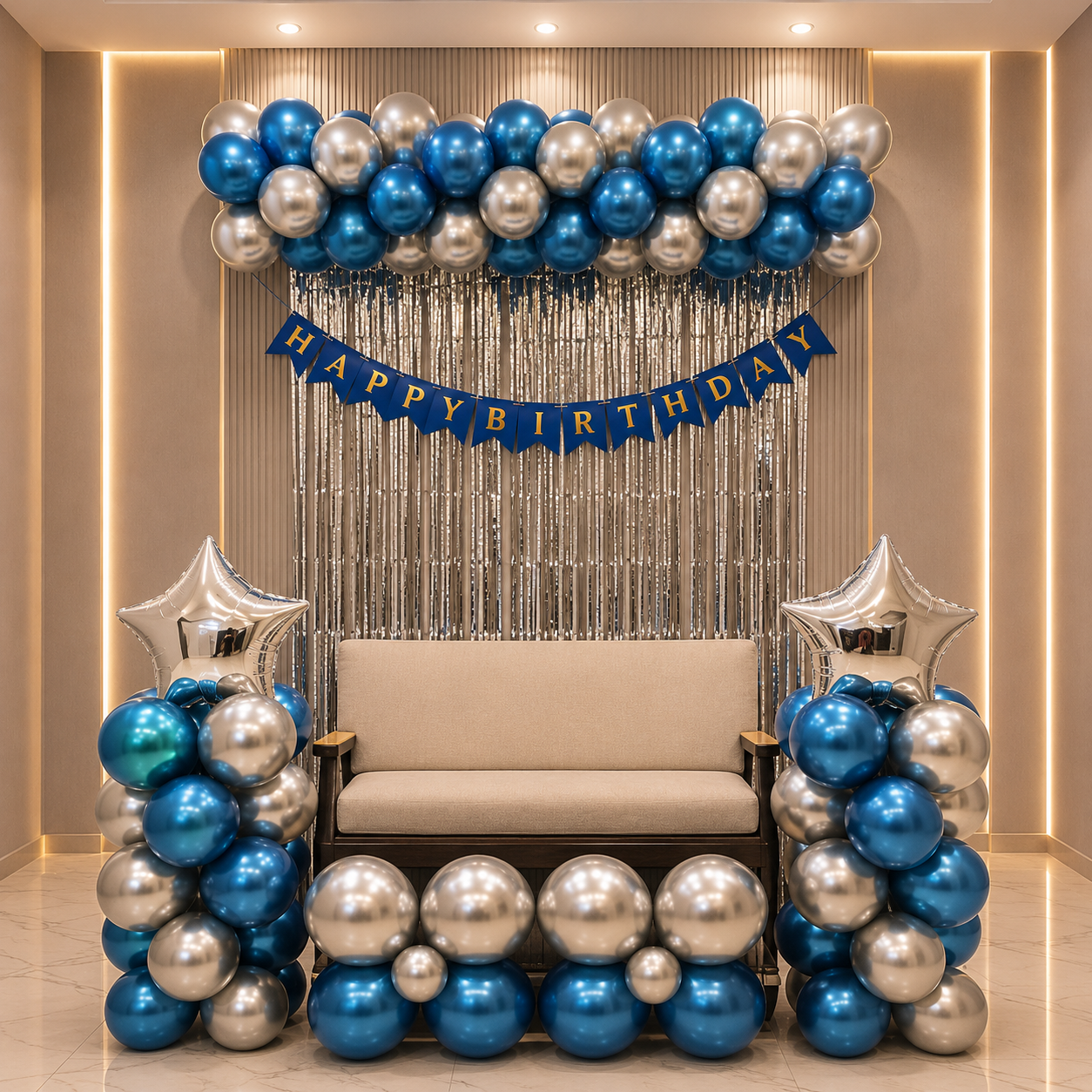Decorative setup with balloons, a chair, and a 'Happy Birthday' banner in a room.