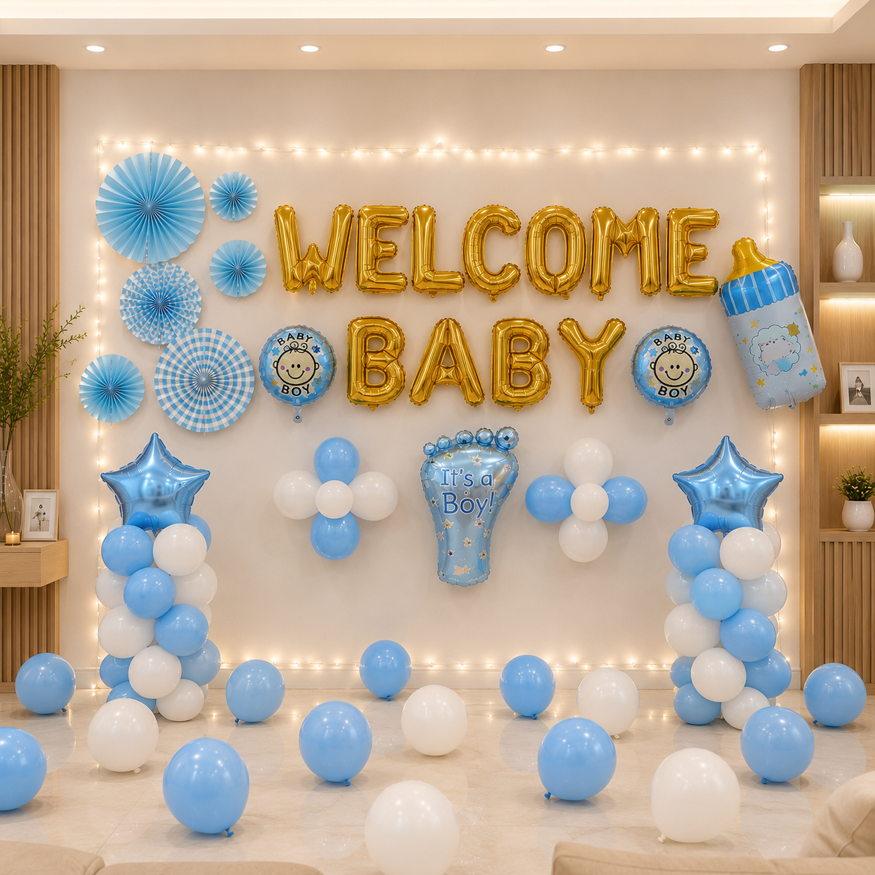 Decorative setup with 'Welcome Baby' balloons and blue, white, and gold balloons on a wall.