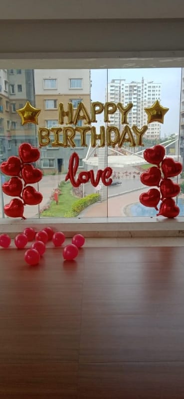 Romantic Surprise for her with Heart Shape Foil Balloons on her birthday with Fairy lights.