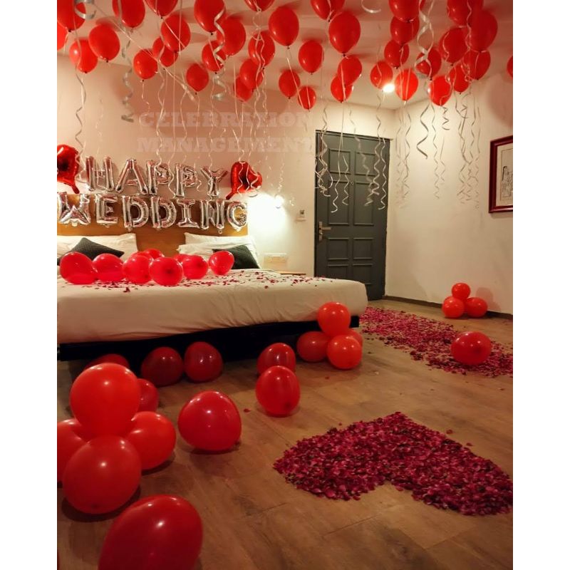 First Night Decoration with balloons and rose petals