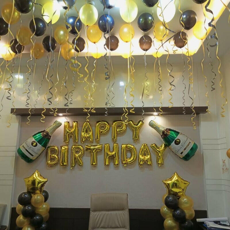 Balloon Decoration at home with Black and Yellow Flowers for birthday party at home and banquet